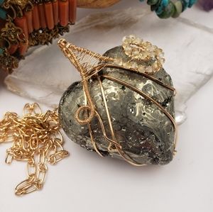 Pyrite heart with pale citrines, bronze wire